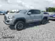2021 Toyota Tacoma SR5 with VIN 3TMAZ5CN9MM148312, listed as a Copart auction lot 63611885 with 95,209 mi miles and Salvage title. Bid and sale history available at DreamBid. Image 1.