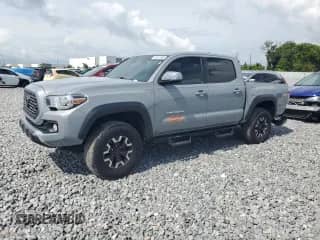 2021 Toyota Tacoma SR5 с VIN 3TMAZ5CN9MM148312, выставлен на аукционе Copart как лот 63611885 с пробегом 95 209 миль миль и Списание • Salvage title. История ставок и продаж доступна на DreamBid. Изображение 1.