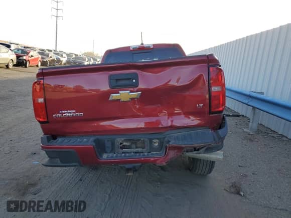 2018 Chevrolet Colorado 4WD LT z VIN 1GCPTCE12J1292996, wystawiony jako Copart lot #77778203 z przebiegiem 42 416 mil mil oraz Szkoda całkowita • Salvage title. Historia ofert i sprzedaży dostępna na DreamBid. Obrazek 6.