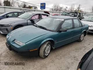 1995 Saturn SL with VIN 1G8ZH5289SZ107203, listed as a Copart auction lot 75160804 with 124,285 mi miles and Non repairable. Bid and sale history available at DreamBid. Image 1.