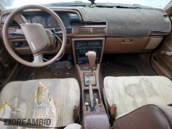 1991 Toyota Camry с VIN 4T1SV24E0MU379572, выставлен на аукционе Copart как лот 78090294 с пробегом 242 052 миль миль и Списание • Salvage title. История ставок и продаж доступна на DreamBid. Изображение 8.