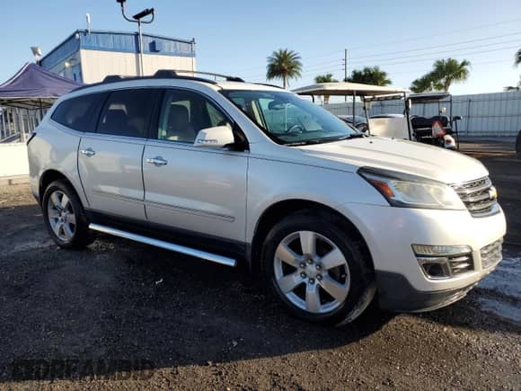 2015 Chevrolet Traverse LTZ с VIN 1GNKRJKD0FJ205512, выставлен на аукционе Copart как лот 55217985 с пробегом Не указан миль и На запчасти • Non repairable. История ставок и продаж доступна на DreamBid. Изображение 4.