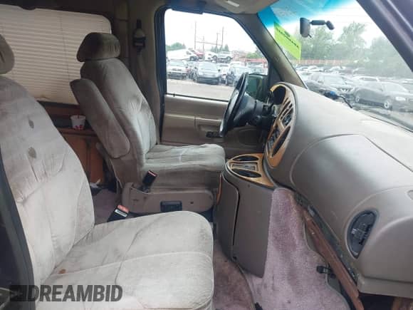 1999 Ford Econoline Cargo Recreational with VIN 1FDRE14L4XHA56517, listed as a IAAI auction lot 42186104 with 200,382 mi miles and . Bid and sale history available at DreamBid. Image 5.