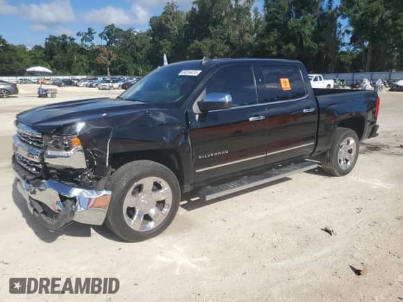 2017 Chevrolet Silverado 1500 LTZ with VIN 3GCPCSEC8HG300946, listed as a Copart auction lot 69234435 with 95,792 mi miles and Salvage title. Bid and sale history available at DreamBid. Image 1.