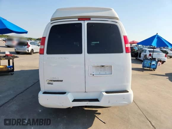 2019 Chevrolet Express Passenger LT с VIN 1GAZGPFG0K1264129, выставлен на аукционе Copart как лот 71447185 с пробегом 54 600 миль миль и Списание • Salvage title. История ставок и продаж доступна на DreamBid. Изображение 6.