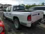 2002 Dodge Dakota SLT with VIN 1B7HG48N12S551650, listed as a Copart auction lot 49324025 with 183,653 mi miles and Salvage title. Bid and sale history available at DreamBid. Image 2.