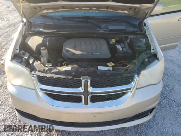 2013 Dodge Grand Caravan SXT with VIN 2C4RDGCG1DR575507, listed as a Copart auction lot 80065985 with 185,478 mi miles and Salvage title. Bid and sale history available at DreamBid. Image 12.