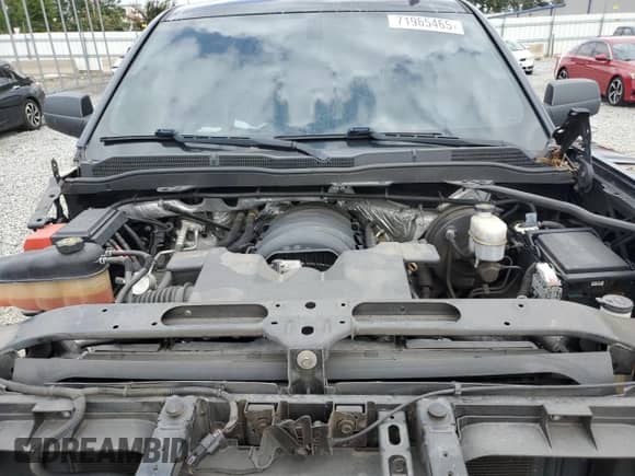 2014 Chevrolet Silverado 1500 LT z VIN 1GCVKREC5EZ263532, wystawiony jako Copart lot #71965465 z przebiegiem 156 056 mil mil oraz Szkoda całkowita • Salvage title. Historia ofert i sprzedaży dostępna na DreamBid. Obrazek 11.
