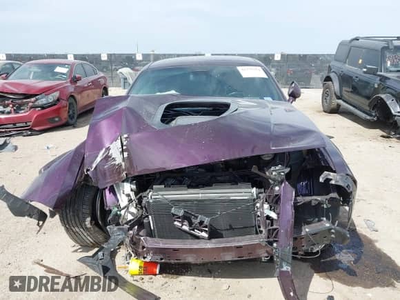 2022 Dodge Challenger R/T Scat Pack z VIN 2C3CDZFJ1NH101447, wystawiony jako IAAI lot #41775354 z przebiegiem Nie podano mil oraz . Historia ofert i sprzedaży dostępna na DreamBid. Obrazek 11.