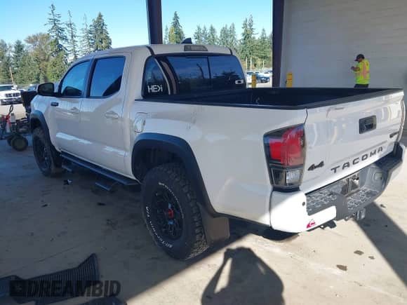 2019 Toyota Tacoma SR with VIN 5TFCZ5AN5KX183237, listed as a IAAI auction lot 43316097 with 115,212 mi miles and . Bid and sale history available at DreamBid. Image 3.