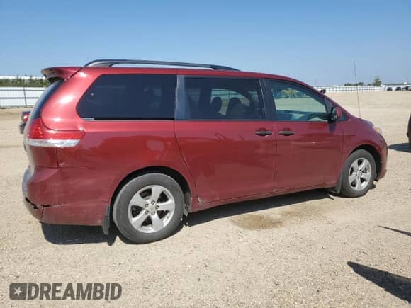 2012 Toyota Sienna with VIN 5TDZK3DCXCS189720, listed as a Copart auction lot 66879435 with 263,075 mi miles and Salvage title. Bid and sale history available at DreamBid. Image 3.