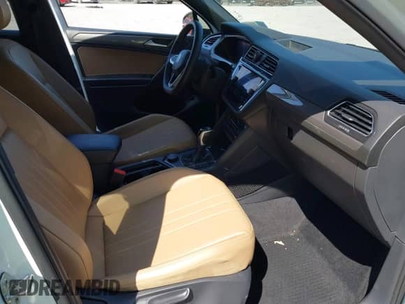 2022 Volkswagen Tiguan SE with VIN 3VV2B7AX9NM045788, listed as a IAAI auction lot 43157757 with 50,553 mi miles and . Bid and sale history available at DreamBid. Image 5.