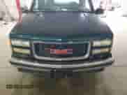 1995 GMC Sierra 1500 z VIN 2GTEC19K2S1558740, wystawiony jako Copart lot #69398185 z przebiegiem 386 899 mil mil oraz Szkoda całkowita • Salvage title. Historia ofert i sprzedaży dostępna na DreamBid. Obrazek 11.