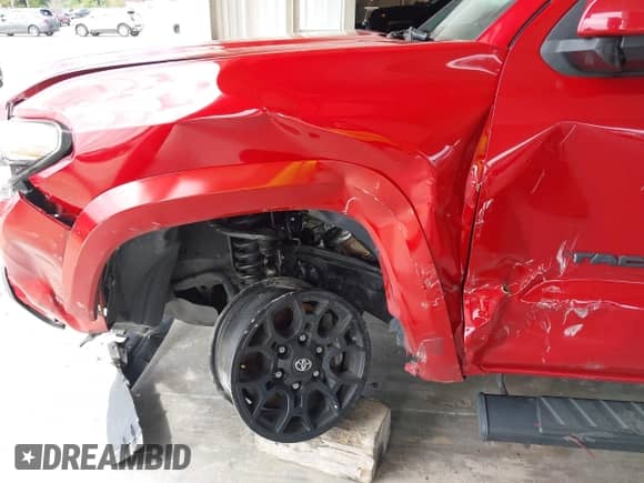 2022 Toyota Tacoma SR5 with VIN 3TMAZ5CN4NM162376, listed as a IAAI auction lot 43198153 with 61,308 mi miles and . Bid and sale history available at DreamBid. Image 6.