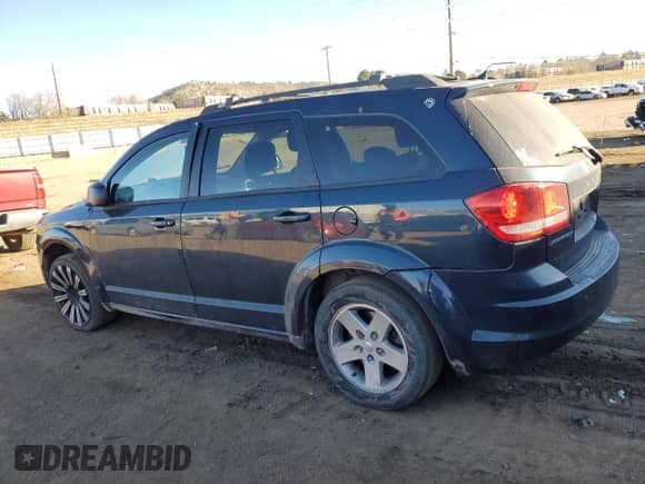 2014 Dodge Journey American Value with VIN 3C4PDCAB0ET268285, listed as a Copart auction lot 86565504 with 138,821 mi miles and Clean title. Bid and sale history available at DreamBid. Image 2.