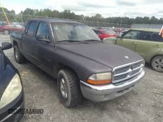 2002 Dodge Dakota SLT with VIN 1B7HL48X12S560958, listed as a IAAI auction lot 42387059 with 212,527 mi miles and . Bid and sale history available at DreamBid. Image 1.