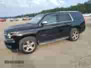 2015 Chevrolet Tahoe LTZ with VIN 1GNSCCKC9FR636937, listed as a Copart auction lot 81036145 with 101,034 mi miles and Salvage title. Bid and sale history available at DreamBid. Image 1.
