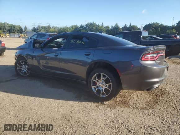 2015 Dodge Charger SXT with VIN 2C3CDXJG3FH742701, listed as a Copart auction lot 71244325 with Not provided miles and Salvage title. Bid and sale history available at DreamBid. Image 2.