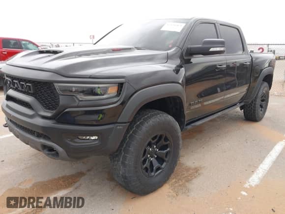 2021 Ram 1500 TRX с VIN 1C6SRFU92MN805007, выставлен на аукционе IAAI как лот 42458464 с пробегом 48 983 миль миль и . История ставок и продаж доступна на DreamBid. Изображение 2.