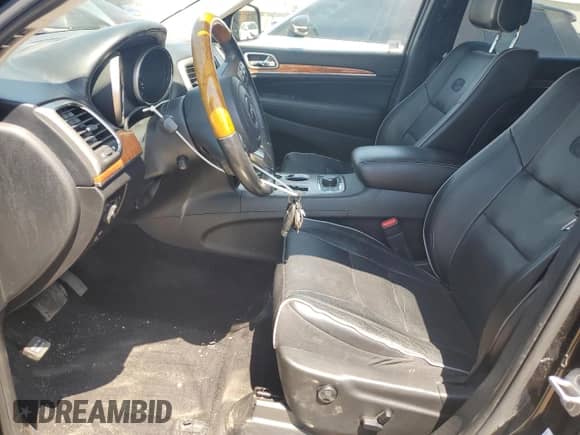 2012 Jeep Grand Cherokee Overland with VIN 1C4RJFCT4CC105320, listed as a Copart auction lot 67323475 with 54,779 mi miles and Salvage title. Bid and sale history available at DreamBid. Image 7.