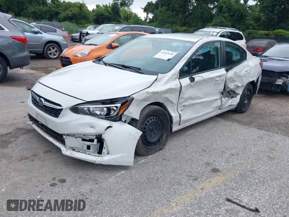 2022 Subaru Impreza with VIN 4S3GKAB64N3603927, listed as a IAAI auction lot 43019458 with 56,557 mi miles and . Bid and sale history available at DreamBid. Image 2.