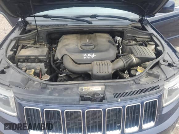 2014 Jeep Grand Cherokee Laredo z VIN 1C4RJFAG1EC239355, wystawiony jako Copart lot #80995415 z przebiegiem 209 285 mil mil oraz Szkoda całkowita • Salvage title. Historia ofert i sprzedaży dostępna na DreamBid. Obrazek 12.