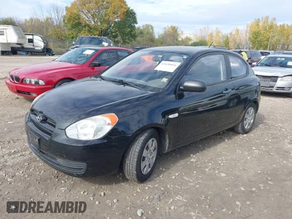 2010 Hyundai Accent GS z VIN KMHCM3AC5AU171490, wystawiony jako IAAI lot #43430054 z przebiegiem 202 776 mil mil oraz . Historia ofert i sprzedaży dostępna na DreamBid. Obrazek 2.