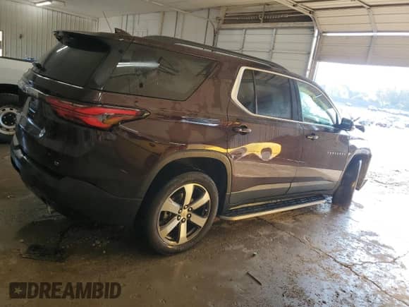 2023 Chevrolet Traverse LT with VIN 1GNERHKW4PJ242152, listed as a Copart auction lot 80753365 with 52,545 mi miles and Salvage title. Bid and sale history available at DreamBid. Image 3.