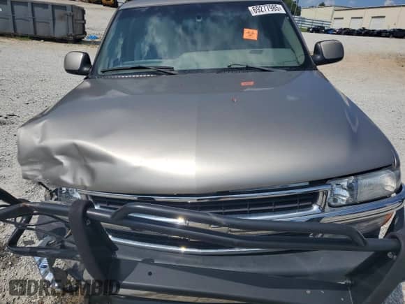 2002 Chevrolet Suburban LT с VIN 3GNGK26G22G133986, выставлен на аукционе Copart как лот 69277985 с пробегом Не указан миль и Списание • Salvage title. История ставок и продаж доступна на DreamBid. Изображение 11.