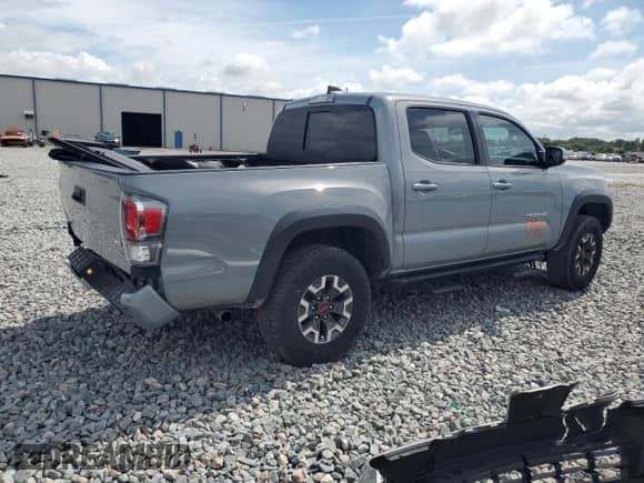 2021 Toyota Tacoma SR5 with VIN 3TMAZ5CN9MM148312, listed as a Copart auction lot 63611885 with 95,209 mi miles and Salvage title. Bid and sale history available at DreamBid. Image 3.
