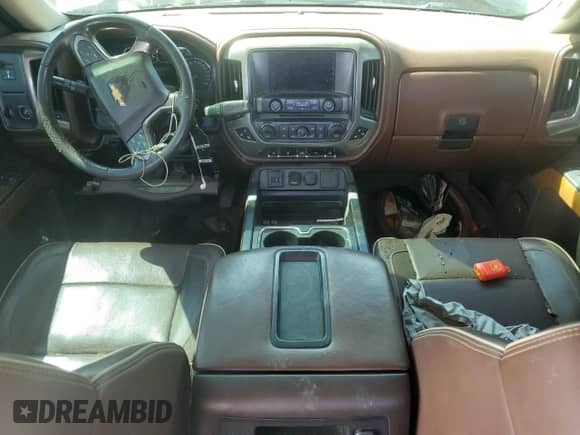 2015 Chevrolet Silverado 1500 High Country z VIN 3GCPCTECXFG295428, wystawiony jako Copart lot #68565264 z przebiegiem Nie podano mil oraz Szkoda całkowita • Salvage title. Historia ofert i sprzedaży dostępna na DreamBid. Obrazek 8.