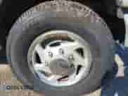 2002 Ford Econoline Cargo with VIN 1FTNE242X2HA90857, listed as a IAAI auction lot 42716391 with 103,796 mi miles and . Bid and sale history available at DreamBid. Image 14.