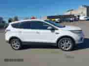 2017 Ford Escape SE with VIN 1FMCU9GD1HUA89219, listed as a IAAI auction lot 43510705 with 159,434 mi miles and . Bid and sale history available at DreamBid. Image 13.