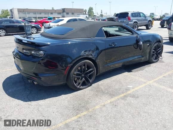 2023 Chevrolet Camaro LT1 z VIN 1G1FF3D79P0135935, wystawiony jako IAAI lot #42515330 z przebiegiem 19 901 mil mil oraz . Historia ofert i sprzedaży dostępna na DreamBid. Obrazek 4.