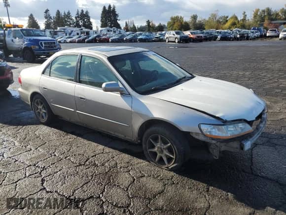 1998 Honda Accord EX z VIN 1HGCG6676WA246099, wystawiony jako Copart lot #76774414 z przebiegiem 228 870 mil mil oraz Szkoda całkowita • Salvage title. Historia ofert i sprzedaży dostępna na DreamBid. Obrazek 4.