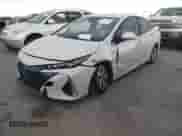 2018 Toyota Prius Plus z VIN JTDKARFP0J3084142, wystawiony jako IAAI lot #41936736 z przebiegiem 50 699 mil mil oraz . Historia ofert i sprzedaży dostępna na DreamBid. Obrazek 19.