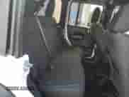 2021 Jeep Wrangler Unlimited 80th Anniversary с VIN 1C4HJXDG9MW557704, выставлен на аукционе Copart как лот 86307875 с пробегом 29 196 миль миль и Списание • Salvage title. История ставок и продаж доступна на DreamBid. Изображение 11.