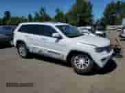 2021 Jeep Grand Cherokee Laredo E with VIN 1C4RJFAG2MC839560, listed as a Copart auction lot 66520265 with 33,127 mi miles and Salvage title. Bid and sale history available at DreamBid. Image 4.