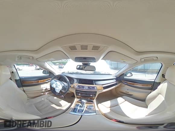 2014 BMW 7 Series 740i с VIN WBAYA6C51ED144132, выставлен на аукционе Copart как лот 55131365 с пробегом 116 826 миль миль и Списание • Salvage title. История ставок и продаж доступна на DreamBid. Изображение 14.