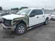 2019 Ford F-150 XL with VIN 1FTEW1E59KKC11770, listed as a IAAI auction lot 42711415 with 130,371 mi miles and . Bid and sale history available at DreamBid. Image 2.