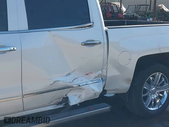2018 Chevrolet Silverado 1500 High Country with VIN 3GCUKTEJ9JG131133, listed as a IAAI auction lot 41389559 with 221,788 mi miles and . Bid and sale history available at DreamBid. Image 6.