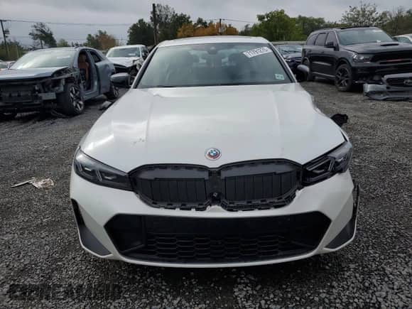 2023 BMW 3 Series 330e xDrive z VIN 3MW39FS02P8D08576, wystawiony jako Copart lot #71791275 z przebiegiem 78 069 mil mil oraz Szkoda całkowita • Salvage title. Historia ofert i sprzedaży dostępna na DreamBid. Obrazek 5.