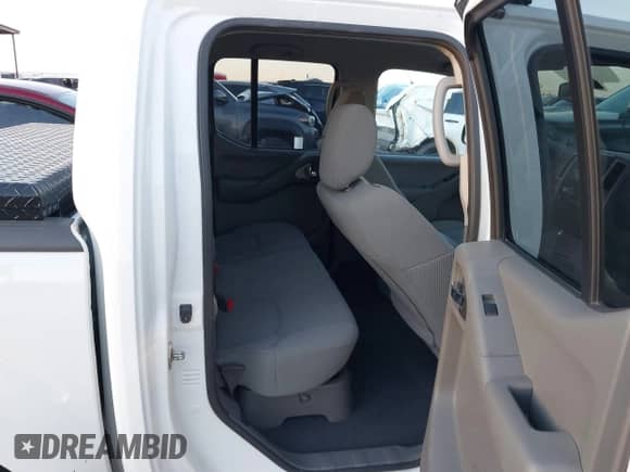 2018 Nissan Frontier SV z VIN 1N6AD0EV2JN765872, wystawiony jako IAAI lot #43418244 z przebiegiem 90 386 mil mil oraz . Historia ofert i sprzedaży dostępna na DreamBid. Obrazek 8.