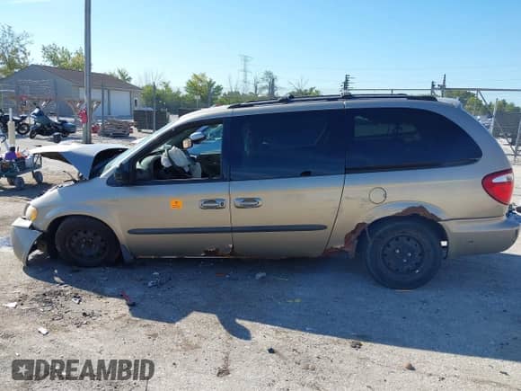 2003 Dodge Caravan Sport with VIN 2D4GP44303R347637, listed as a IAAI auction lot 43084209 with 131,416 mi miles and . Bid and sale history available at DreamBid. Image 14.