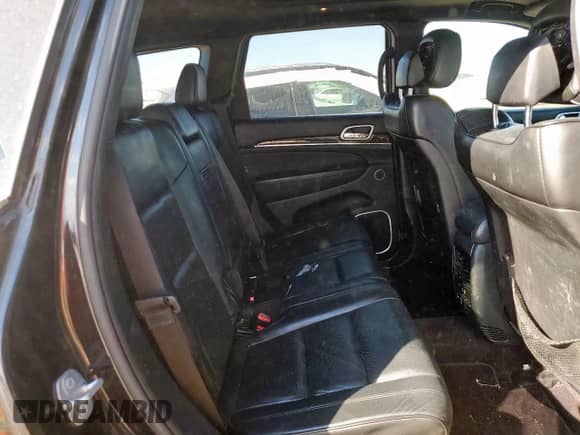 2016 Jeep Grand Cherokee High Altitude with VIN 1C4RJECGXGC422473, listed as a Copart auction lot 82463265 with 106,626 mi miles and Salvage title. Bid and sale history available at DreamBid. Image 11.