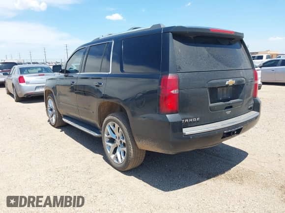 2018 Chevrolet Tahoe Premier z VIN 1GNSKCKC9JR196813, wystawiony jako IAAI lot #42684940 z przebiegiem 185 060 mil mil oraz . Historia ofert i sprzedaży dostępna na DreamBid. Obrazek 3.