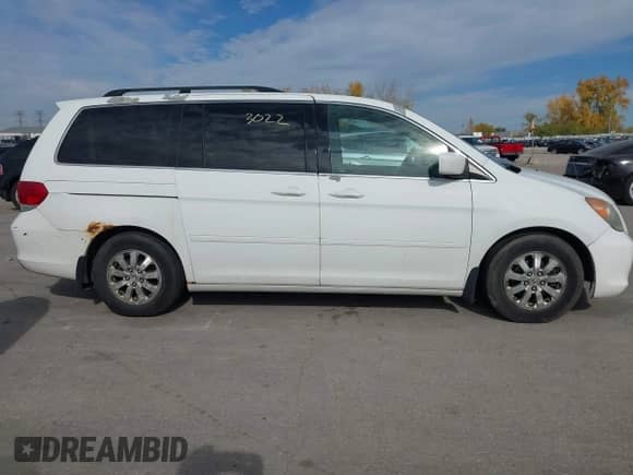 2008 Honda Odyssey EX z VIN 5FNRL38468B024033, wystawiony jako IAAI lot #43543022 z przebiegiem Nie podano mil oraz . Historia ofert i sprzedaży dostępna na DreamBid. Obrazek 14.