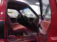 1990 GMC Sierra 1500 z VIN 1GTDK14K7LE522631, wystawiony jako IAAI lot #41424510 z przebiegiem 263 201 mil mil oraz . Historia ofert i sprzedaży dostępna na DreamBid. Obrazek 5.
