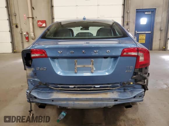 2014 Volvo S60 T5 with VIN YV1612FH1E2272823, listed as a Copart auction lot 83863665 with 88,004 mi miles and Salvage title. Bid and sale history available at DreamBid. Image 6.