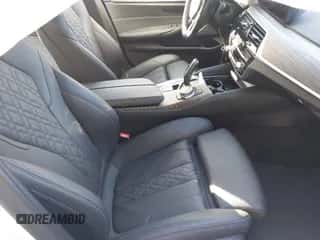 2021 BMW 5 Series 540i xDrive with VIN WBA73BJ09MWX25421, listed as a IAAI auction lot 43141798 with 44,389 mi miles and . Bid and sale history available at DreamBid. Image 5.